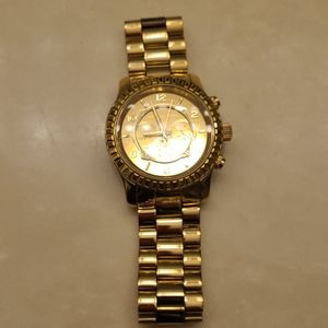 MK gold watch